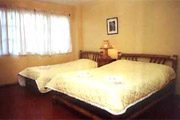 The Sun Village Beachfront Resort Deluxe Room
